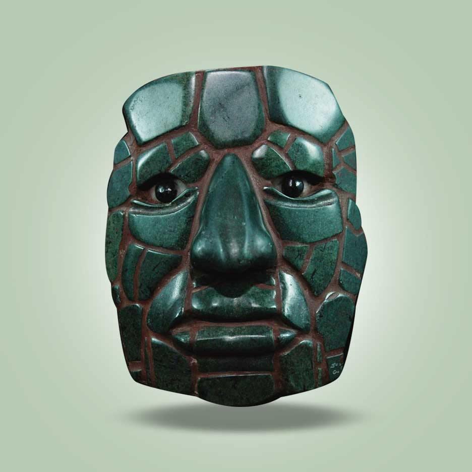 Bryde igennem uddrag involveret Calakmul Mosaic Mask – Jade Maya